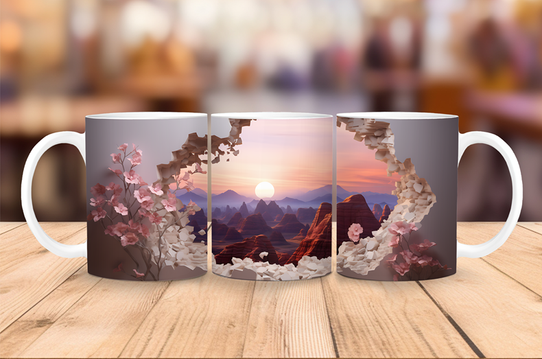 Ceramic coffee mug featuring a 3D canyon illusion with a glowing sunrise, layered mountains, and soft pink blossoms.