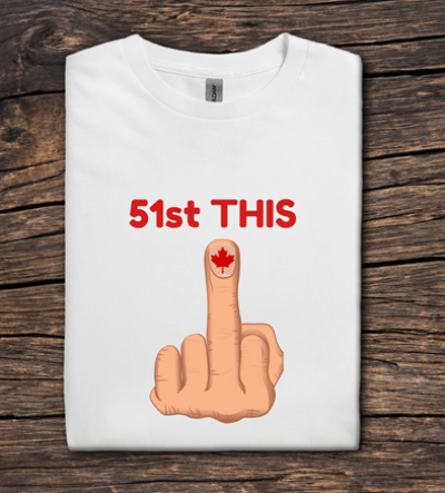 White t-shirt with a graphic of a middle finger with a red maple leaf and text '51st THIS' on a wooden surface