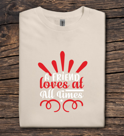 Beige t-shirt with red and white text on a wooden surface