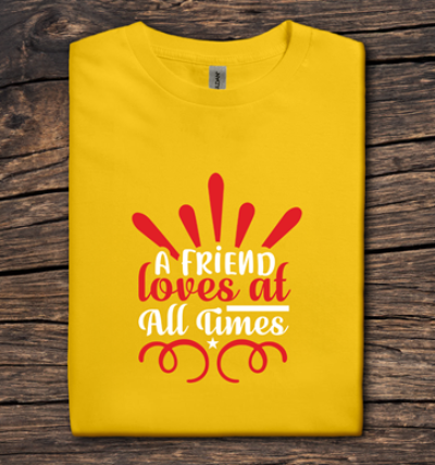 Yellow t-shirt with a motivational quote on a wooden surface