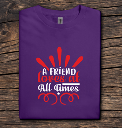 Purple t-shirt with motivational quote on a wooden surface