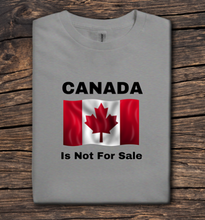 Gray t-shirt with Canadian flag and text on a wooden surface