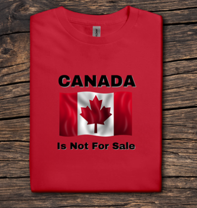 Red t-shirt with Canadian flag and 'Canada is Not For Sale' text on a wooden surface
