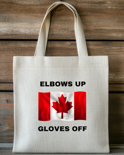 Tote bag with Canadian flag and text 'ELBOWS UP GLOVES OFF' on a wooden background