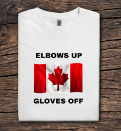White t-shirt with Canadian flag and text on a wooden surface