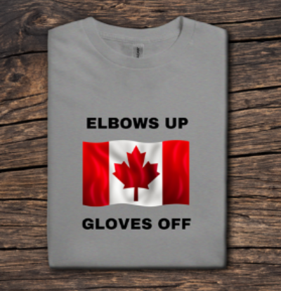 Gray t-shirt with Canadian flag and text on a wooden surface