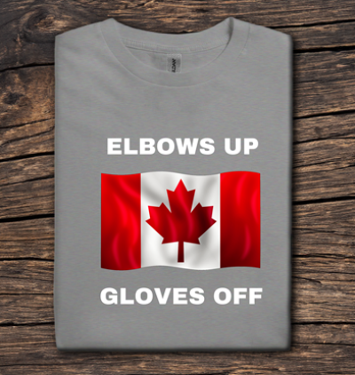 Gray t-shirt with Canadian flag and text on a wooden surface