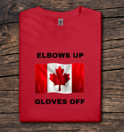Red t-shirt with a Canadian flag and text on a wooden surface