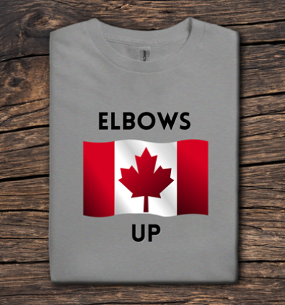 Gray t-shirt with Canadian flag and 'ELBOWS UP' text on a wooden surface