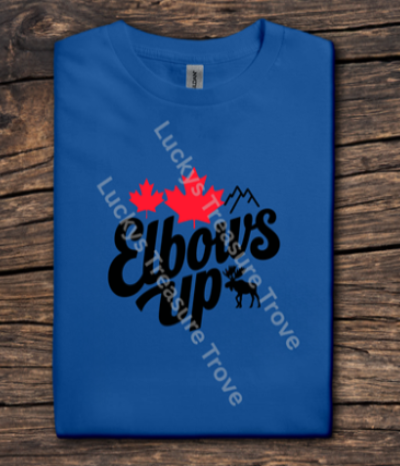 Blue t-shirt with black text and red maple leaf on a wooden surface