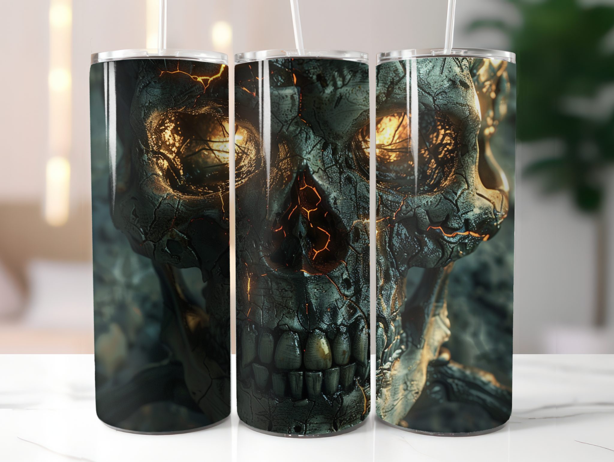 Three cylindrical candles with skull designs on a white surface.