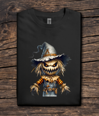 Black t-shirt with a scarecrow design on a wooden surface