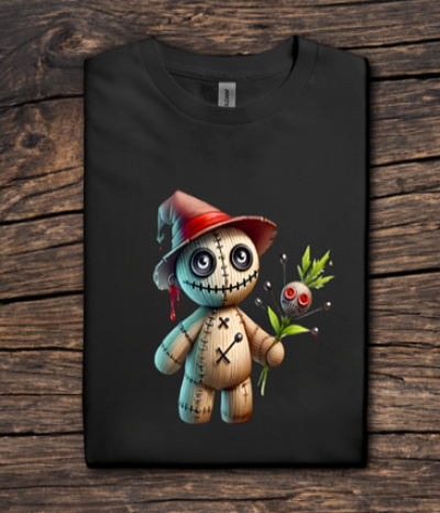 Black t-shirt with a cartoon character holding a small creature on a wooden surface