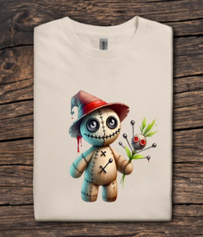 T-shirt with a cartoonish voodoo doll design on a wooden surface