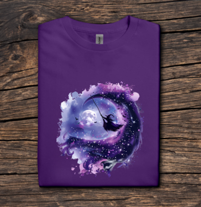 Purple t-shirt with a galaxy design on a wooden surface
