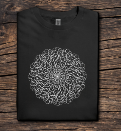 Black t-shirt with white circular design on a wooden surface