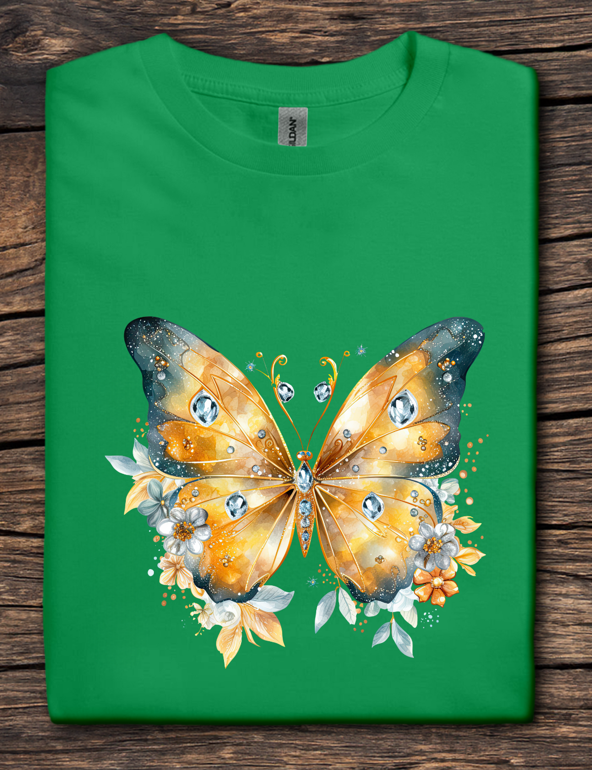 Green t-shirt with a butterfly design on a wooden surface
