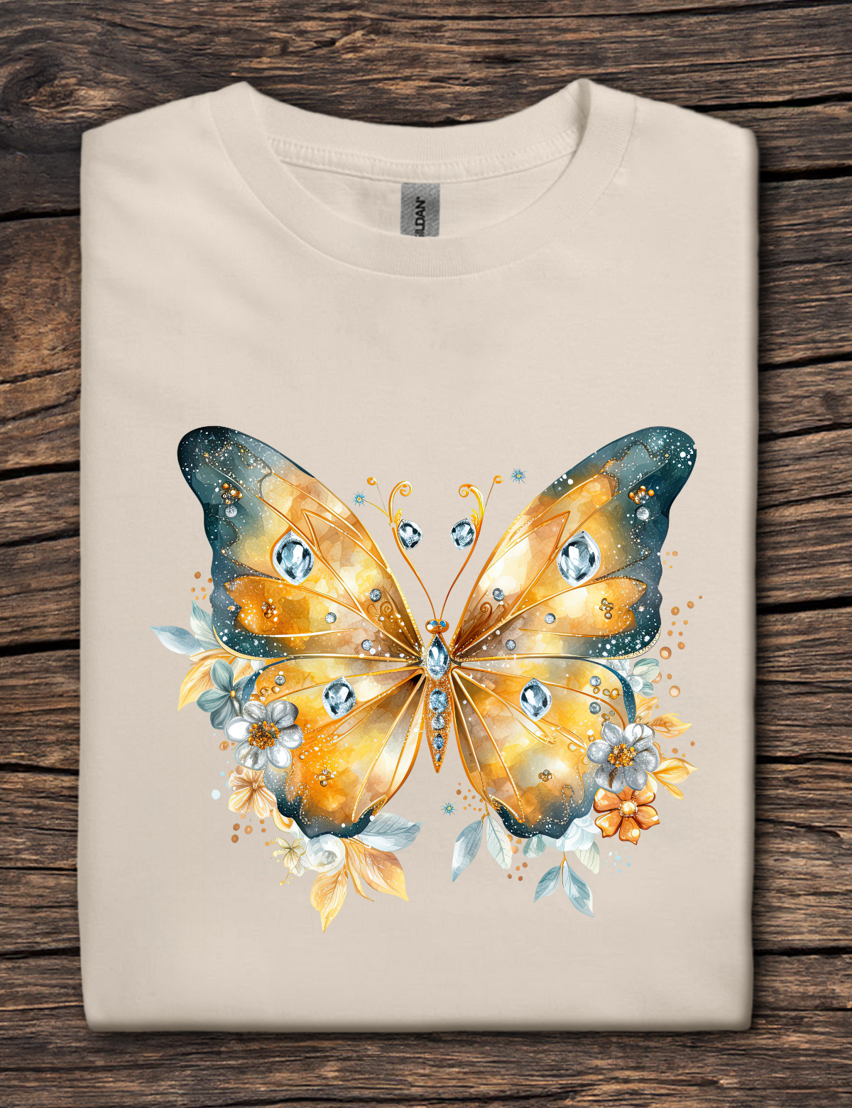 Beige t-shirt with a colorful butterfly design on a wooden surface