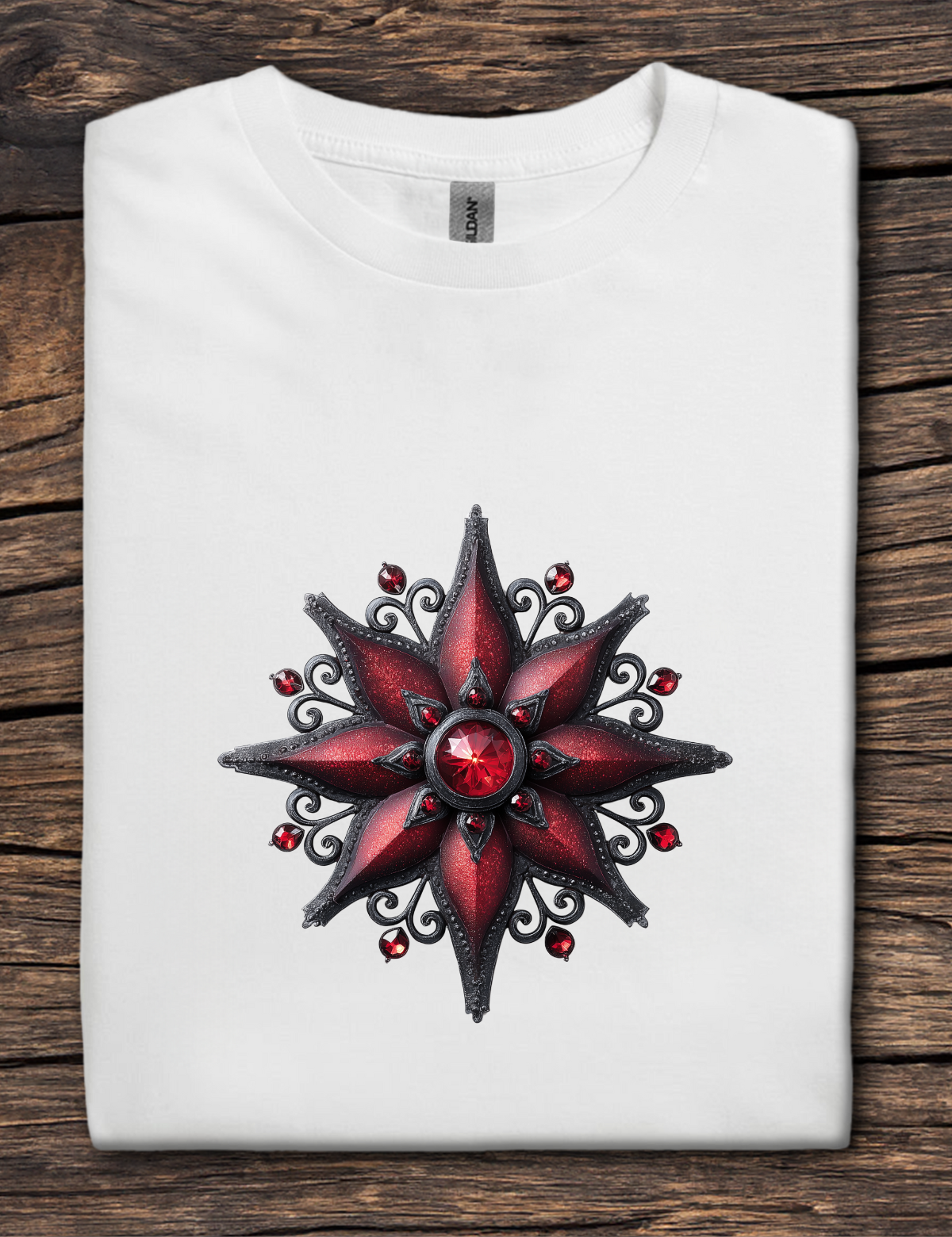 White t-shirt with a red and black star design on a wooden surface