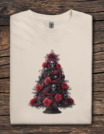 Beige t-shirt with a black Christmas tree design featuring skulls and red roses on a wooden surface.