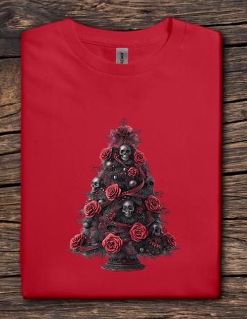Red t-shirt with a black Christmas tree design featuring skulls and roses on a wooden surface.