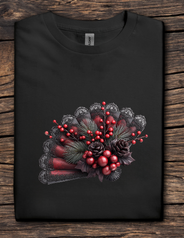 Black t-shirt with a decorative design of red berries and green leaves on a wooden surface