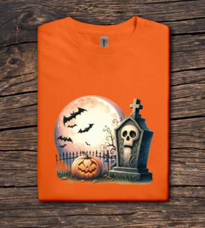 Orange t-shirt with Halloween design featuring a pumpkin, bats, and gravestone on a wooden background