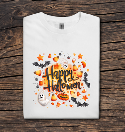 White t-shirt with 'Happy Halloween' design on a wooden surface
