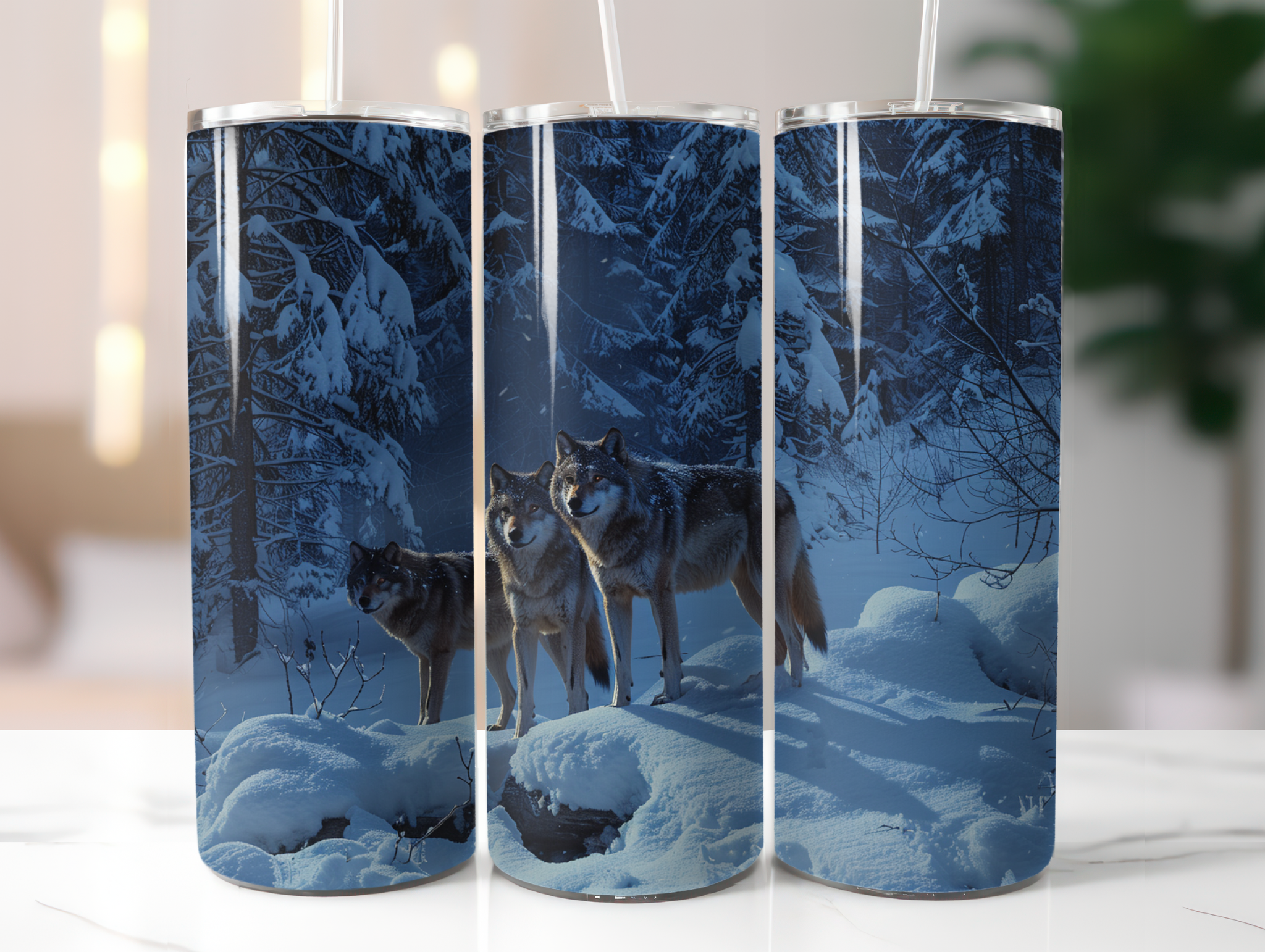 Three tumbler cups with a winter scene design featuring wolves in a snowy forest.
