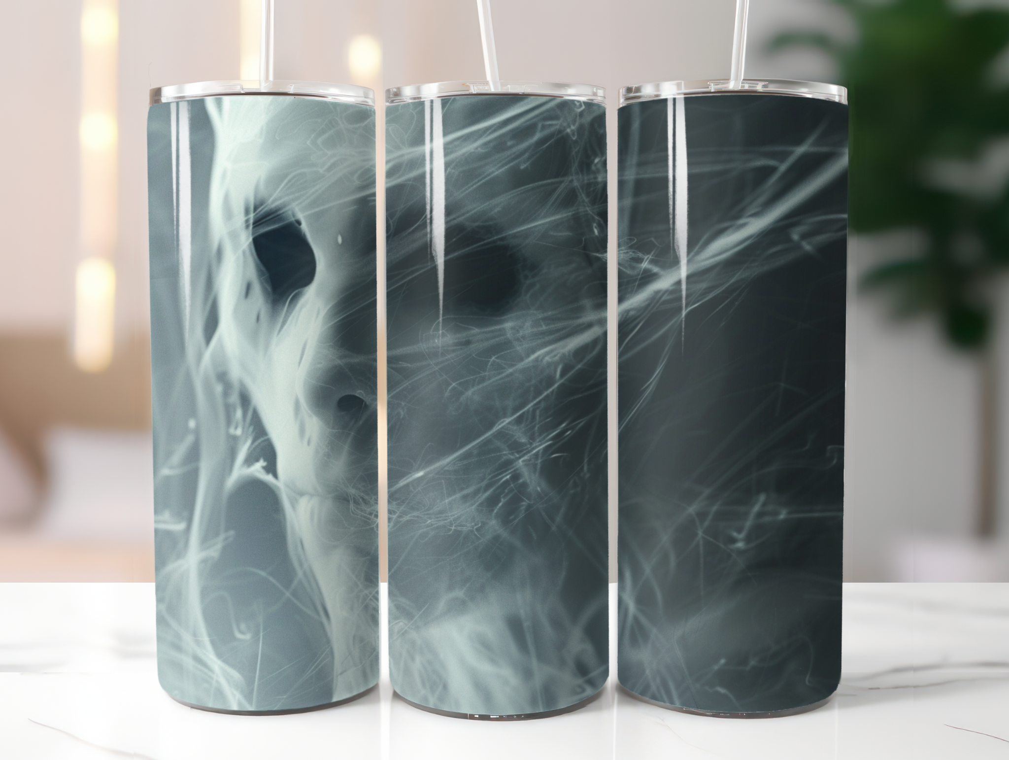 Three marbled cylindrical containers on a white surface with a blurred indoor background.