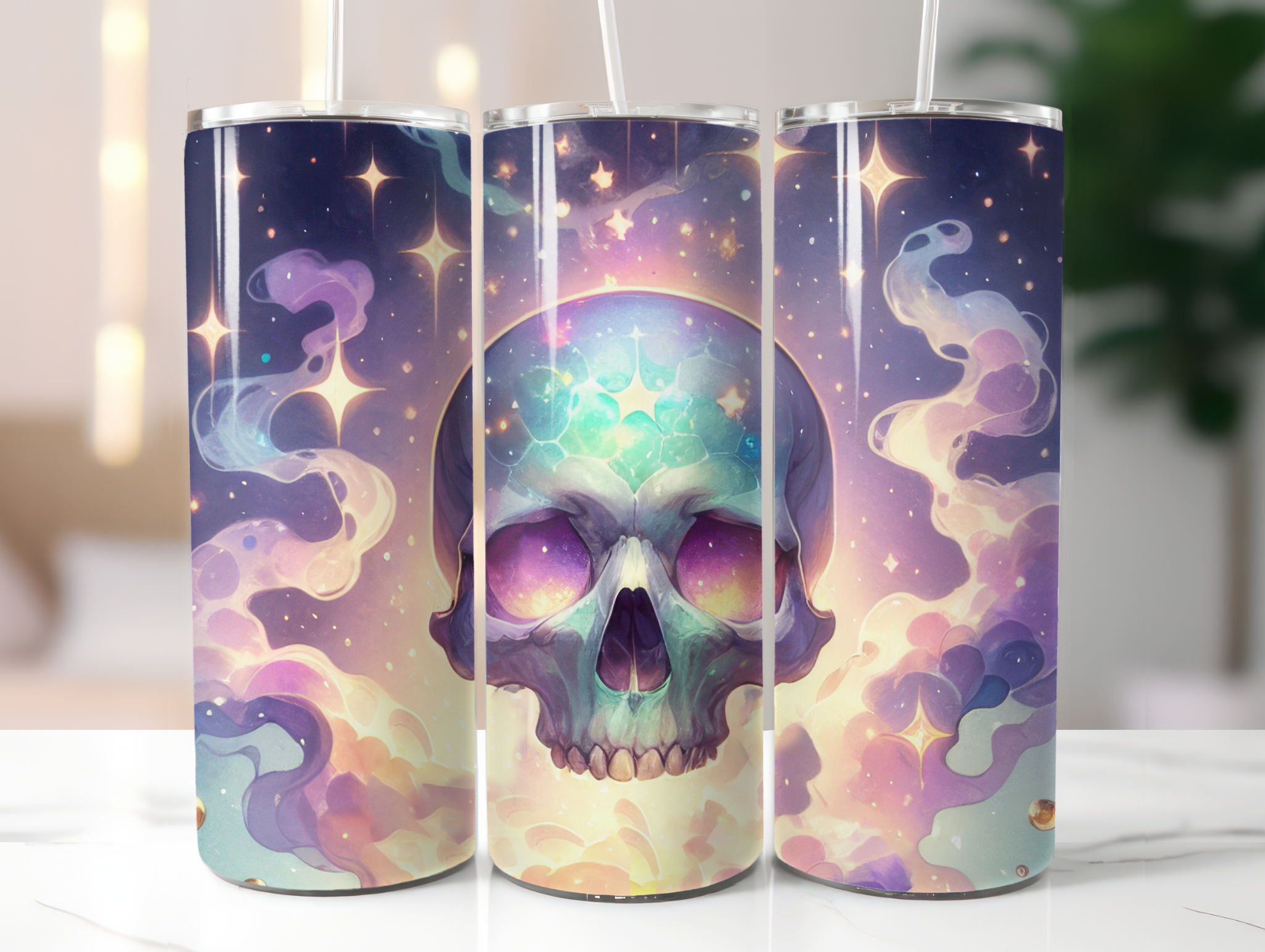 Three cylindrical tumblers with a colorful skull design on a white surface.