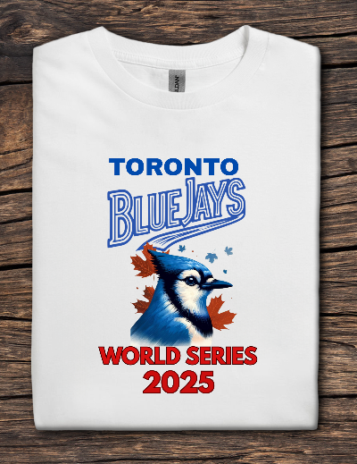 White t-shirt with Toronto Blue Jays World Series 2025 design on a wooden surface